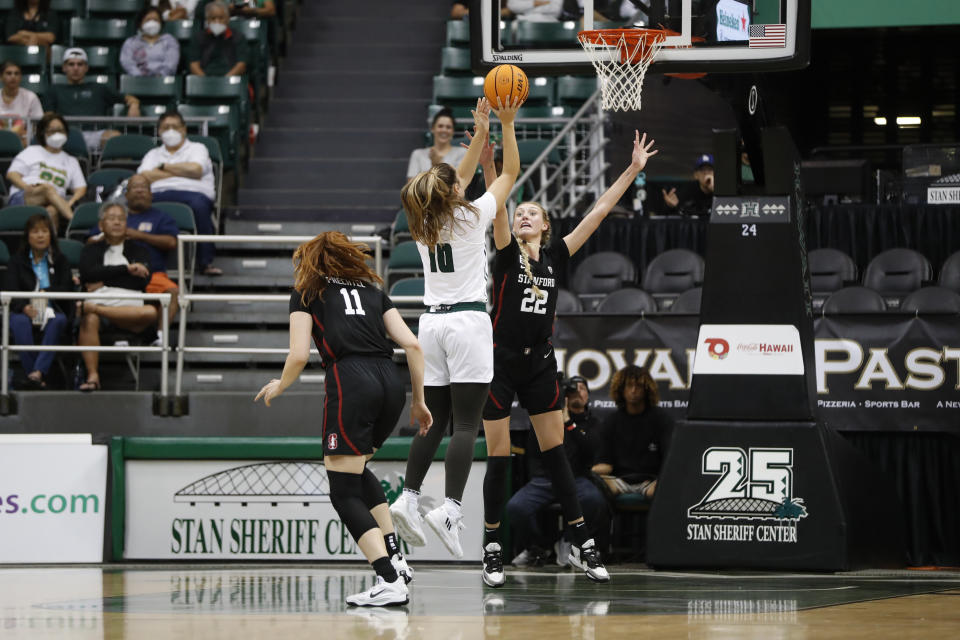 Hawaii forward Meg Jefferson (10) shoots over Stanford forward Cameron Brink (22) during the third quarter of an NCAA college basketball game, Sunday, Nov. 27, 2022, in Honolulu. (AP Photo/Marco Garcia)