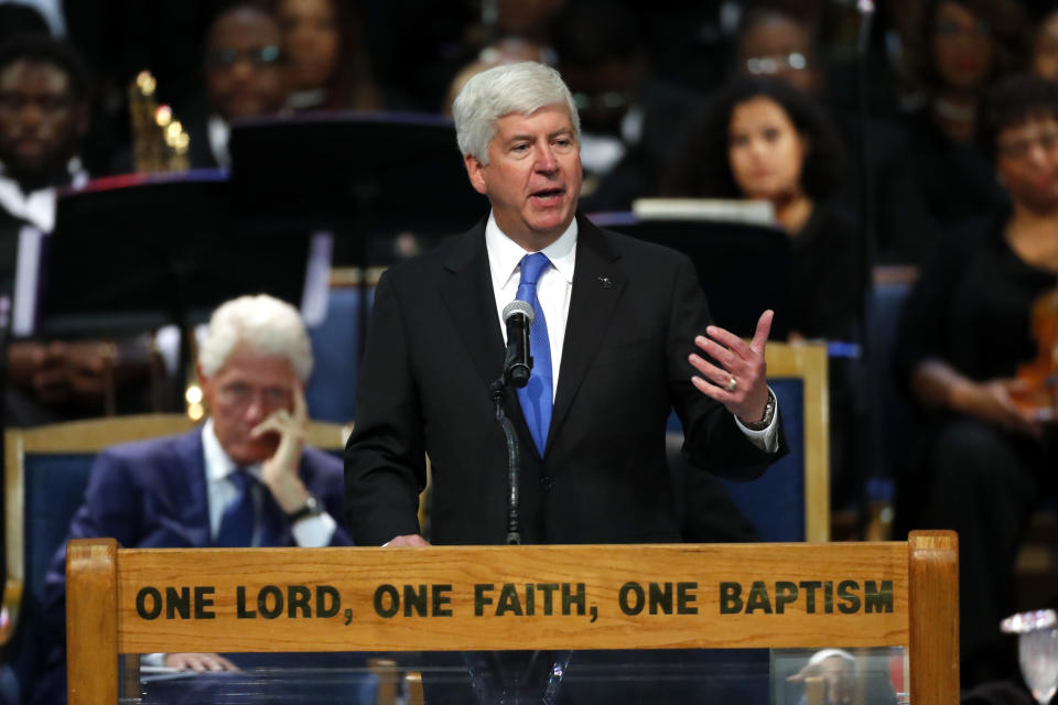 FILE - In this Aug. 31, 2018, file photo, Michigan Gov. Rick Snyder speaks during the funeral service for Aretha Franklin in Detroit. The former governor is backing Joe Biden for president, becoming the latest high-profile Republican to support the Democratic nominee over President Donald Trump. Snyder said Thursday, Sept. 3, 2020, that Biden “is a man of deep faith and commitment to family, decency and integrity.”(AP Photo/Paul Sancya, File)