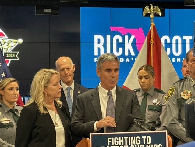 Tom and Gena Hoyer, who lost their son Luke Hoyer, 15, following the shooting at Marjory Stoneman Douglas High School on Feb. 14, 2018, speak during a press conference April 25, 2023 at the Collier County Sheriff's Office headquarters as Sen. Rick Scott introduces a school safety bill he hopes to get signed into law.