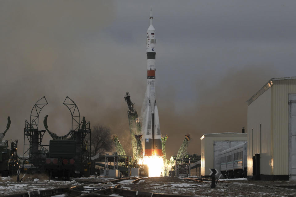 The Soyuz-2.1a rocket booster with Soyuz MS-20 space ship carrying Russian Roscosmos cosmonaut Alexander Misurkin, and spaceflight participants Japanese fashion tycoon Yusaku Maezawa, and Japanese producer Yozo Hirano blasts off at the Russian leased Baikonur cosmodrome, Kazakhstan, Wednesday, Dec. 8, 2021. A Japanese billionaire and his producer rocketed to space Wednesday as the first self-paying space tourists in more than a decade. (Ivan Timoshenko/Roscosmos Space Agency via AP)