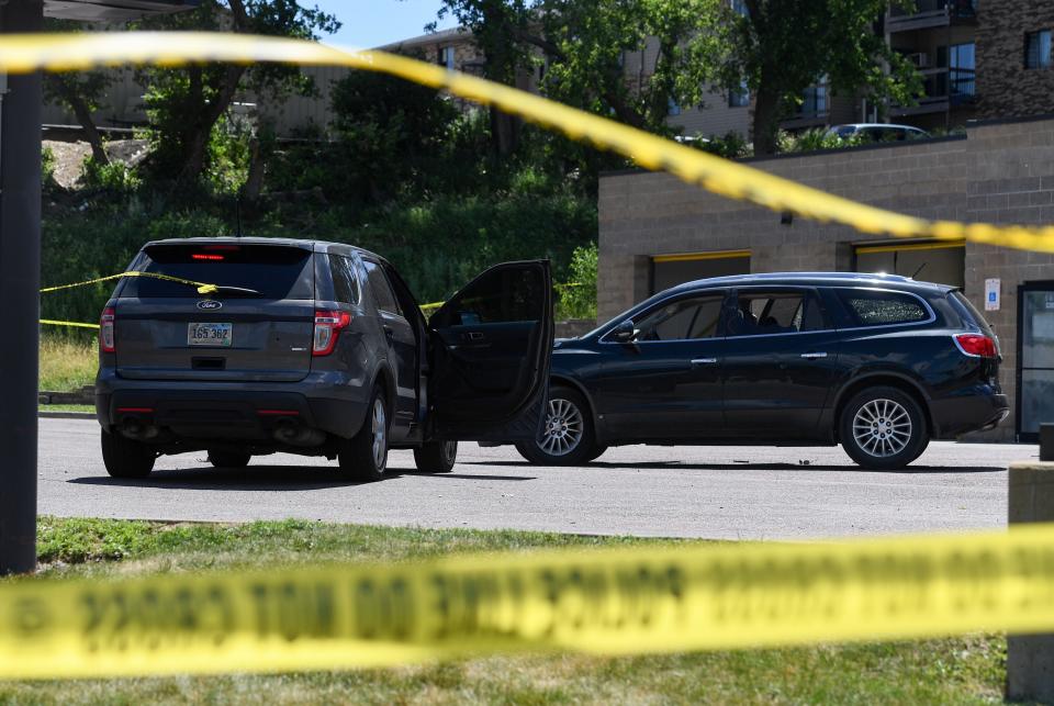 Police tape blocks off the scene of what police call an officer-involved shooting on Monday, July 11, 2022, at the H2Ose It car wash on Cleveland Avenue in Sioux Falls.