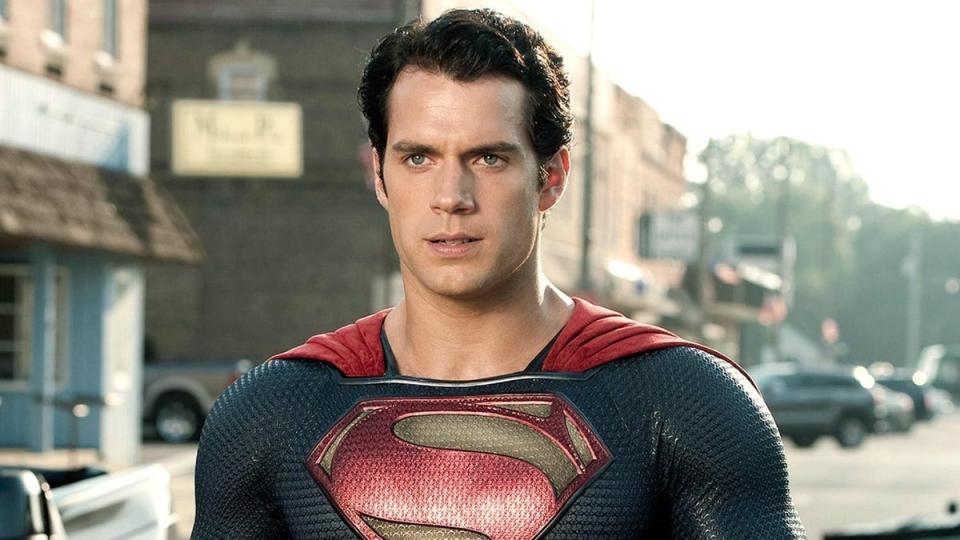 Henry Cavill as Superman standing in Smallville.