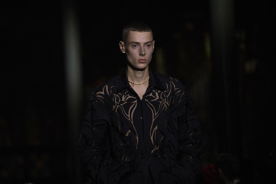 A model wears a creation for the Valentino Spring-Summer 2022 ready-to-wear fashion show in Paris, Friday, Oct. 1, 2021. (Photo by Vianney Le Caer/Invision/AP)