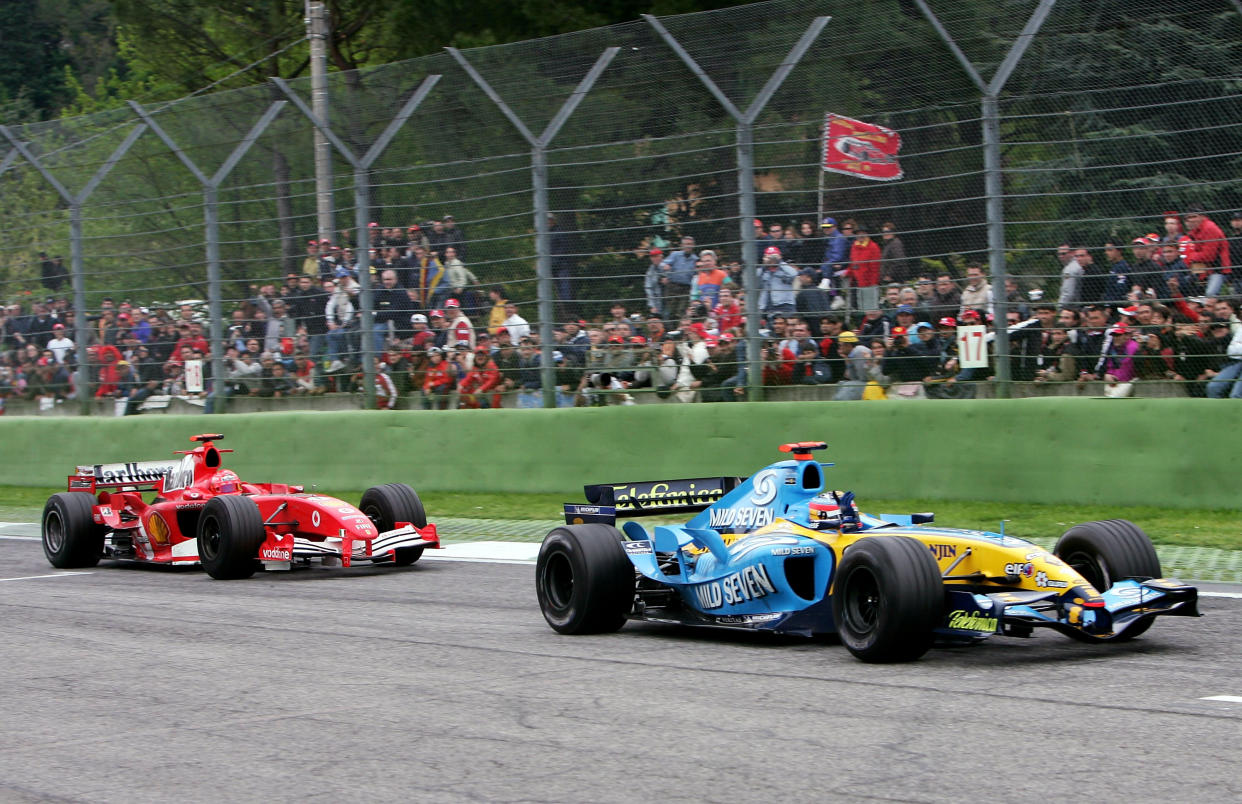 IMOLA, ITALY - APRIL 24:  Fernando Alonso of Spain and Renault celebrates winning the San Marino F1 Grand Prix at the San Marino Circuit on April 24, 2005, in Imola, Italy. (Photo by Mark Thompson/Getty Images)