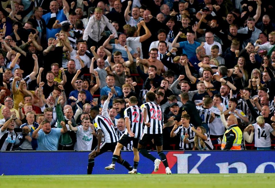 Isak celebrates his opening goal (PA)