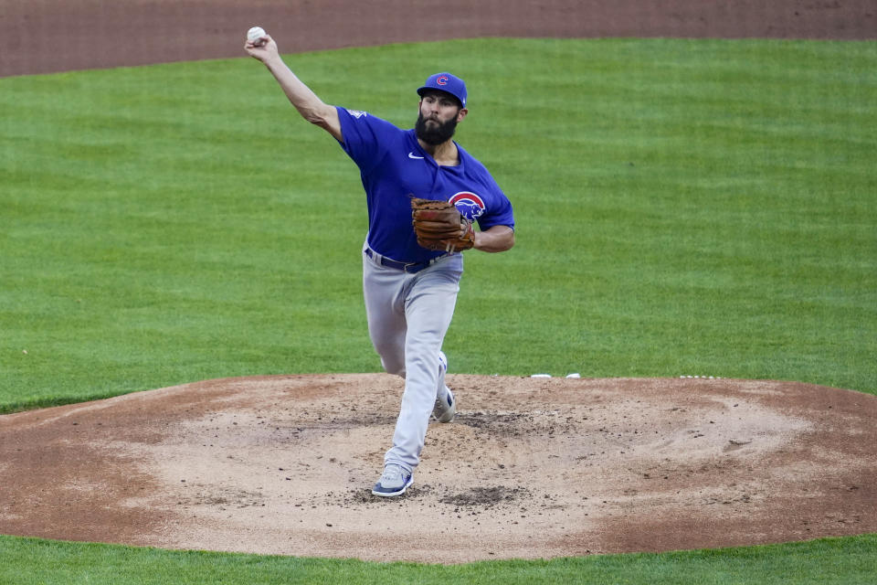 Chicago Cubs starting pitcher Jake Arrieta throws during the first inning of the team's baseball game against the Cincinnati Reds on Friday, April 30, 2021, in Cincinnati. (AP Photo/Jeff Dean)