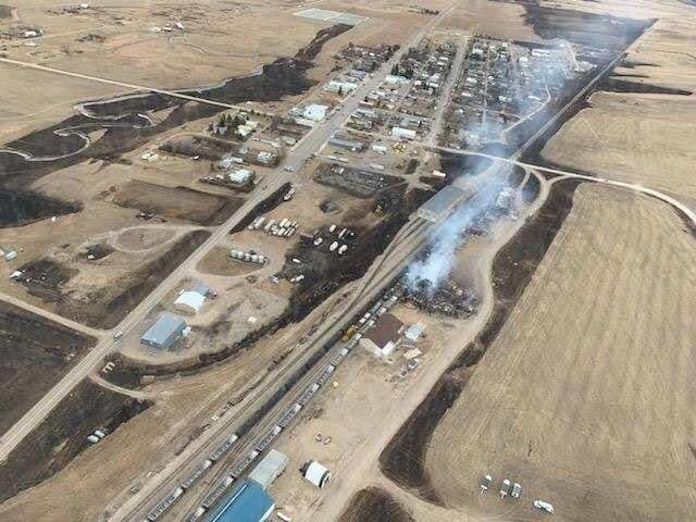 Aerial view of the path of the West Wind Fire, which at one point was burning on both sides of the small Montana town.