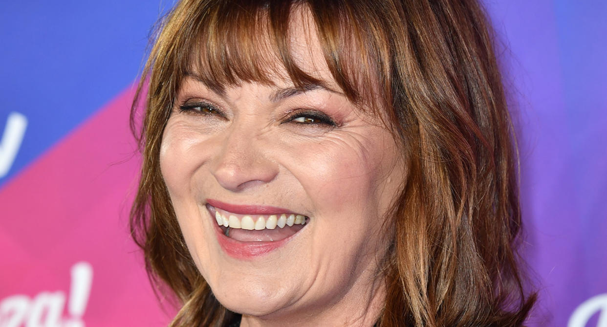 Lorraine Kelly's latest look is the perfect transeasonal outfit - and it's on sale. (Getty Images)