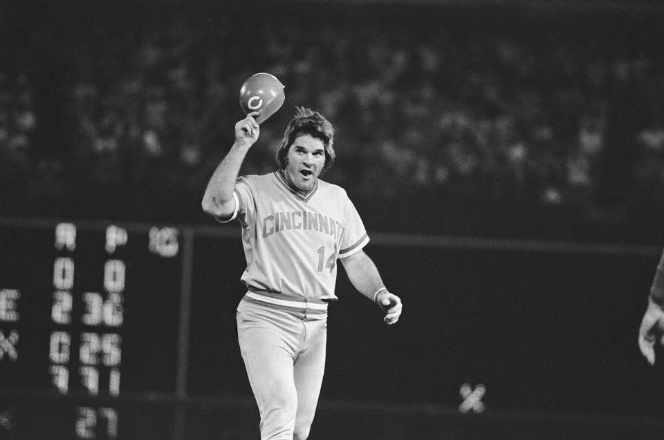 FILE - In this July 31, 1978 file photo, Cincinnati Reds third baseman Pete Rose tips his cap to the crowd after hitting in his 44th straight game in Atlanta. Rose says cheating on the field is bad for the game, and the one thing he never did with his bets is change the outcome of a game. (AP Photo/Steve Helber, File )