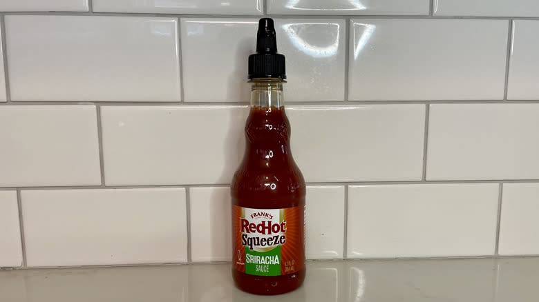 dark red hot sauce bottle 