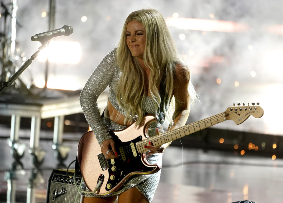 Lindsay Ell performs "Like A Lady" at the CMT Music Awards at the Bridgestone Arena on Wednesday, June 9, 2021, in Nashville, Tenn. (AP Photo/Mark Humphrey)