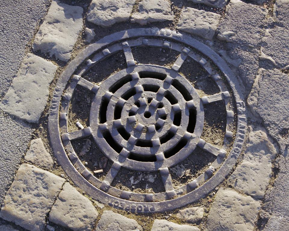 Iron drain cover made by Affleck, Prospect Works, Swindon, Wiltshire, 2006. (Photo by English Heritage/Heritage Images/Getty Images)