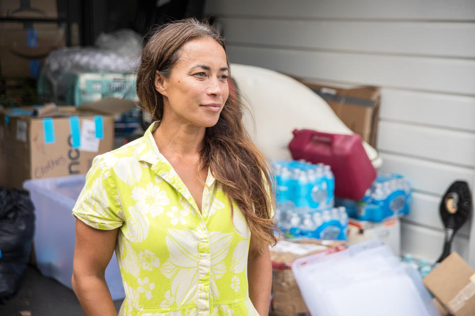 [15 August 2023 - Maui, HI] 
Tiare Lawrence's home has become a supply hub for residents displaced by the Lahaina fires. (Brock Stoneham / NBC News)