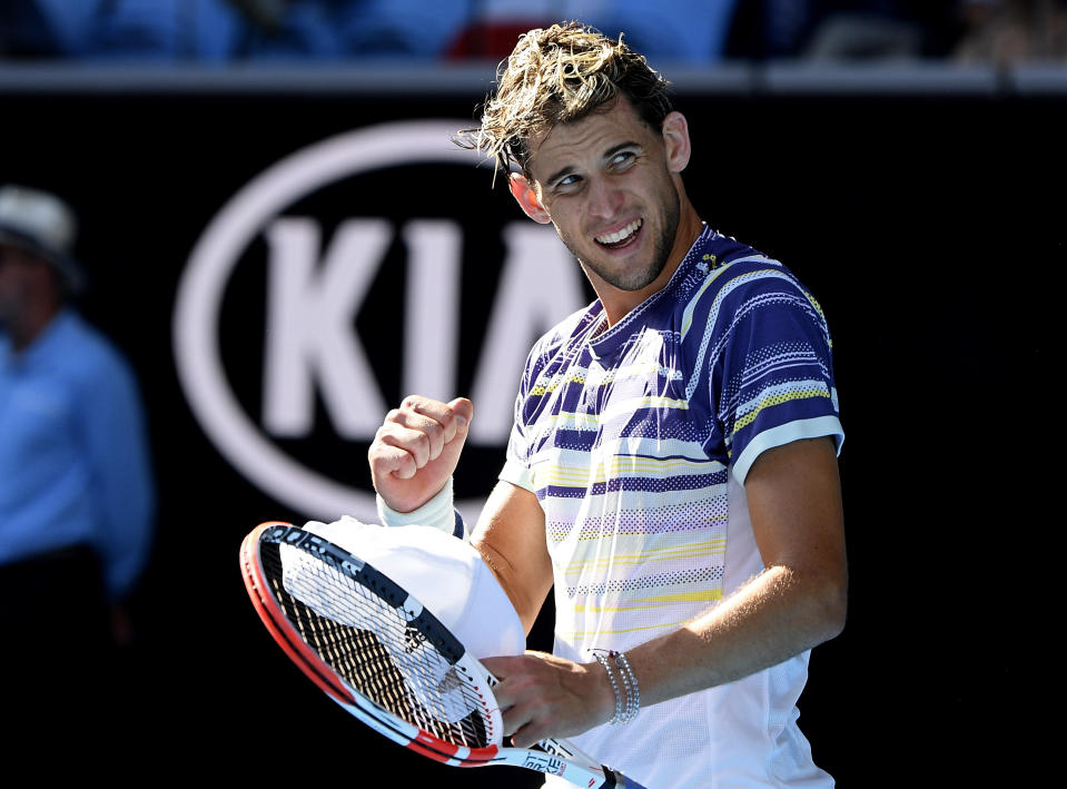 Austria's Dominic Thiem celebrates after defeating Taylor Fritz of the U.S. in their third round singles match at the Australian Open tennis championship in Melbourne, Australia, Saturday, Jan. 25, 2020. (AP Photo/Andy Brownbill)