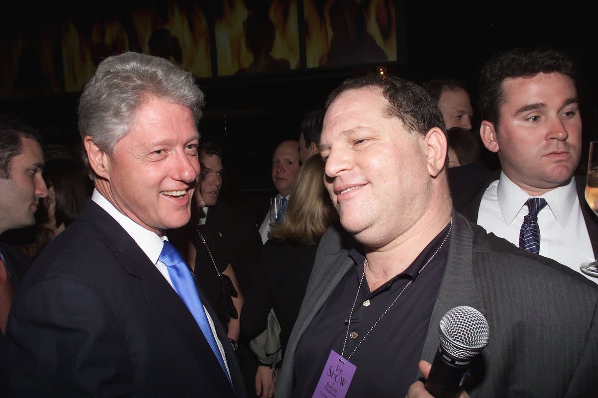 Weinstein, right, pictured with Bill Clinton in 2000, was once a powerful Hollywood producer (Getty Images)