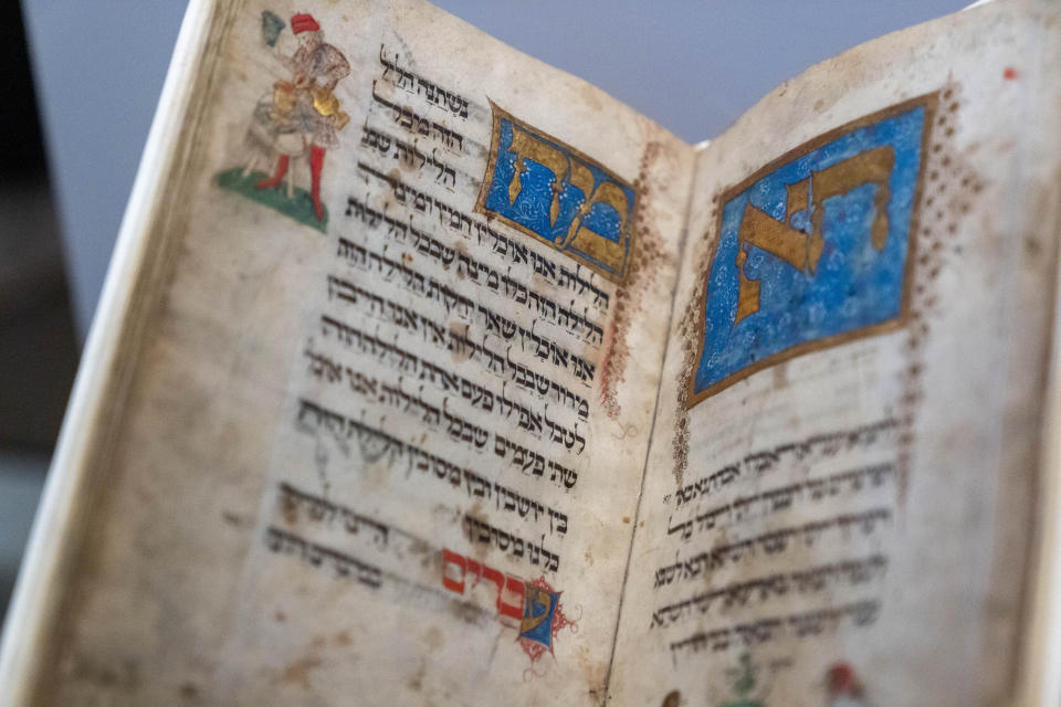 A Passover Haggadah from 1478 is among the items on display in the exhibit, "Collecting Memories: Treasures from the Library of Congress," during a media preview at the Library of Congress, Monday, June 10, 2024, in Washington. (AP Photo/Jacquelyn Martin)