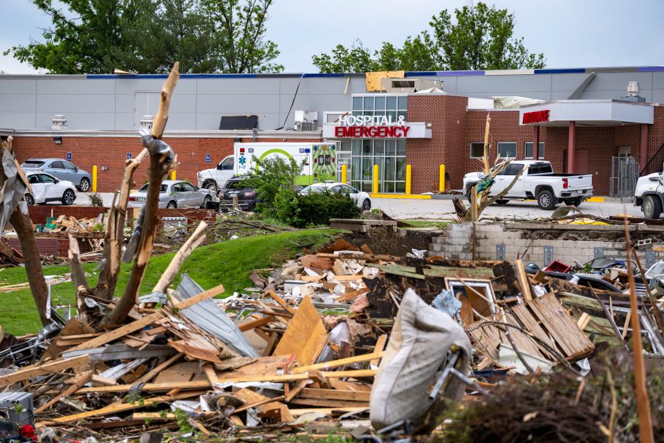 Debris is scattered all around the hospital in Greenfield, Wednesday, May 22, 2024. Multiple residents were killed when a tornado struck the town Tuesday afternoon.