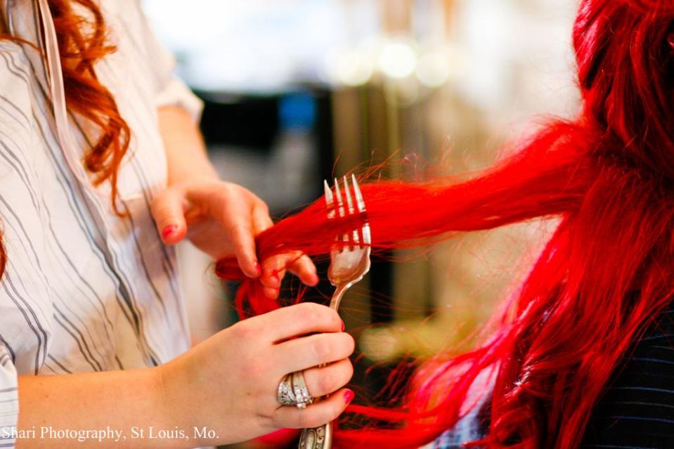 <div class="caption-credit"> Photo by: Shari Photography</div>Jamie preps for the wedding by having her hair combed with Ariel the Mermaid's "Dinglehopper."