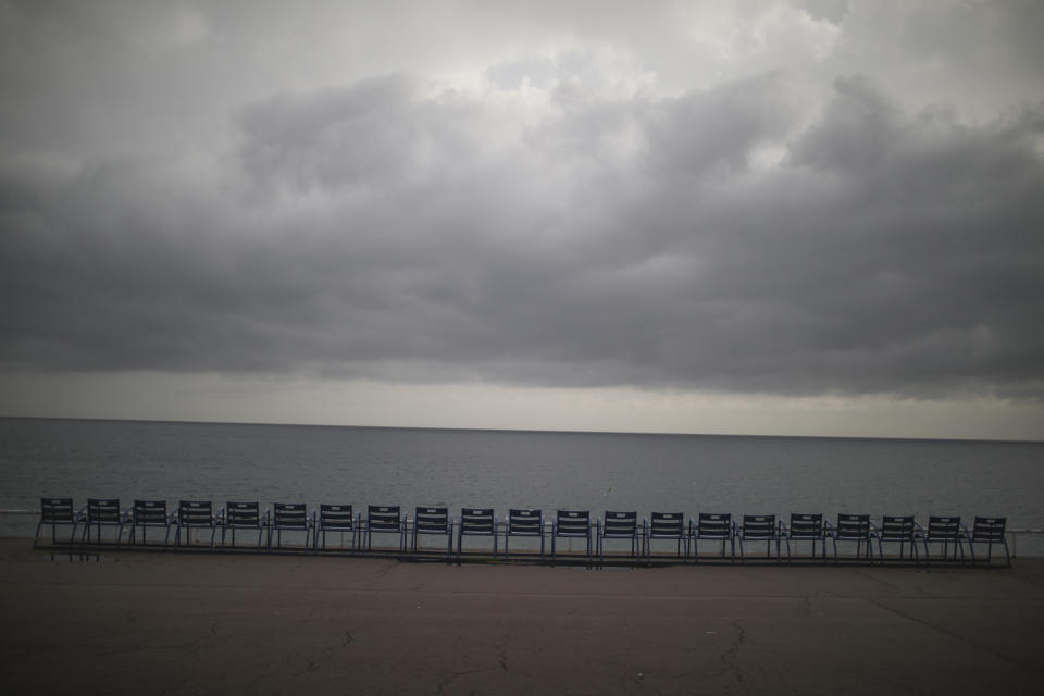 FILE - In this Saturday, Feb. 27, 2021 file photo, a row of empty chairs is pictured along the Promenade des Anglais in Nice, southern France. Europe recorded 1 million new COVID-19 cases last week, an increase of 9% from the previous week and ending a six-week decline, WHO said Thursday, March 4, 2021. The so-called UK variant is of greatest concern in the 53 countries monitored by WHO in Europe. (AP Photo/Daniel Cole, File)