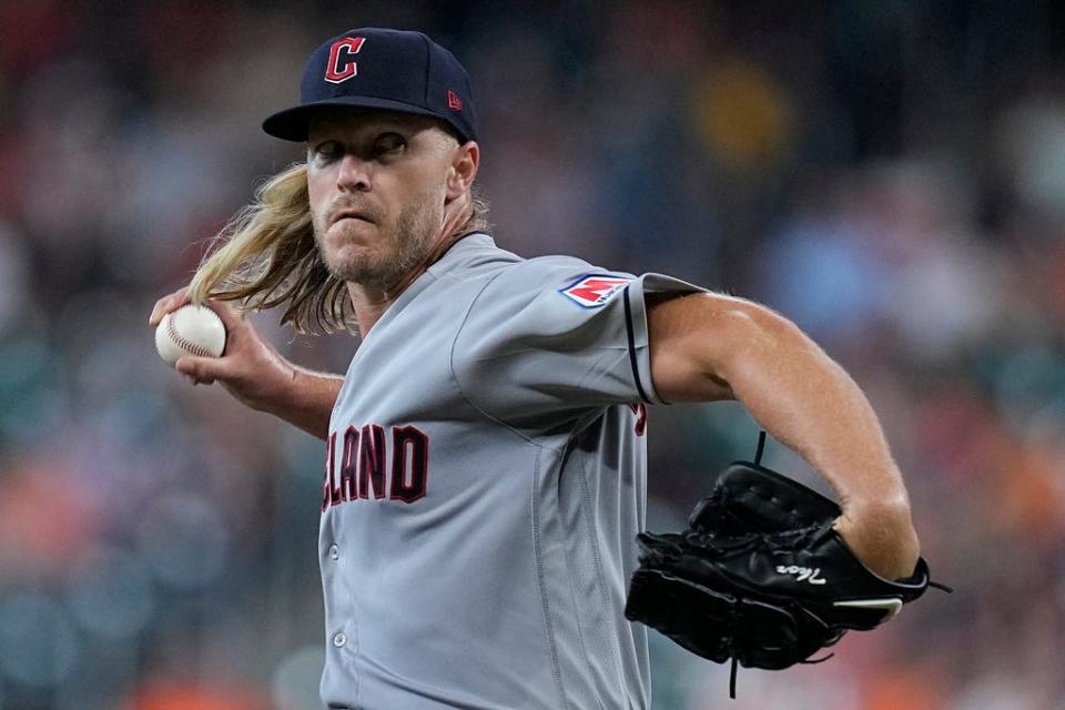 Cleveland Guardians starting pitcher Noah Syndergaard delivers during the first inning of a baseball game against the Houston Astros, Monday, July 31, 2023, in Houston. (AP Photo/Kevin M. Cox)