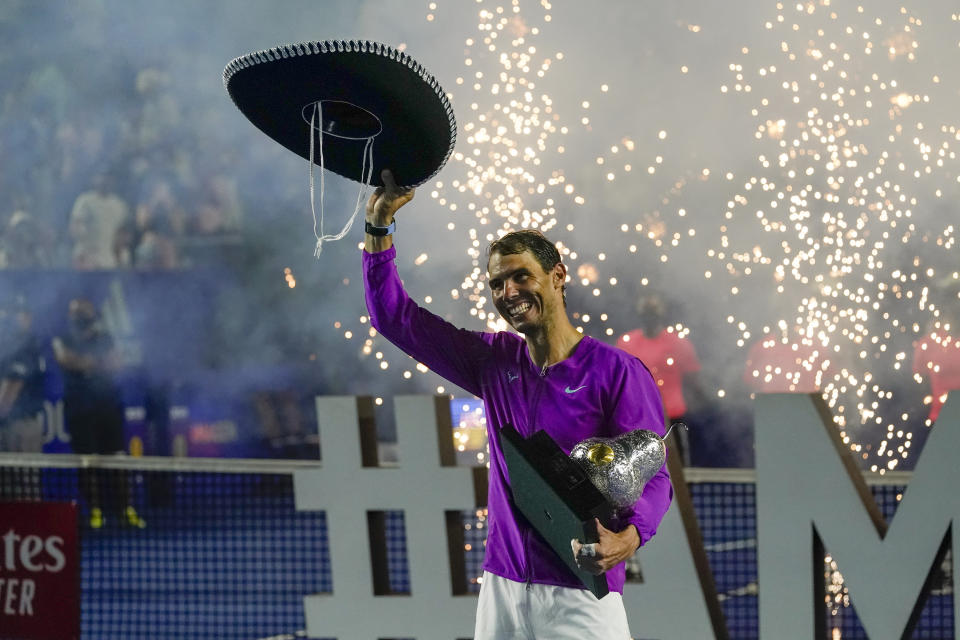 Spain's Rafael Nadal celebrates after defeating Britain's Cameron Norrie in the final match at the Mexican Open tennis tournament in Acapulco, Mexico, Saturday, Feb. 26, 2022. (AP Photo/Eduardo Verdugo)