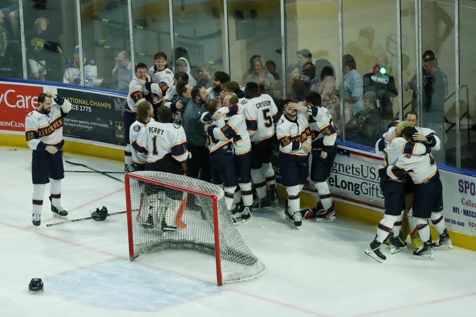 The Peoria Rivermen mob each other behind the net after JM Piotrowski's game-winning goal in overtime delivered the SPHL President's Cup to Peoria in a Game 4 win over Roanoke at Berglund Center on May 3, 2022.