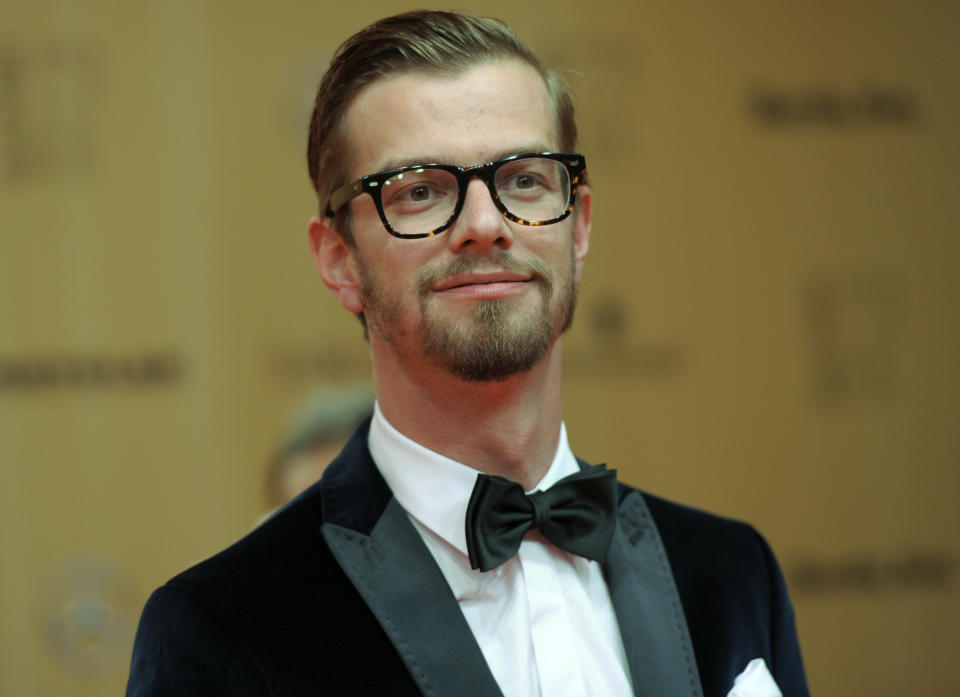 German presenter Joko Winterscheidt arrives on the red carpet for the Bambi 2015 media awards ceremony in Berlin, Germany November 12, 2015. The annual Bambi awards honour celebrities from the world of entertainment, literature, sports and politics.  REUTERS/Stefanie Loos 