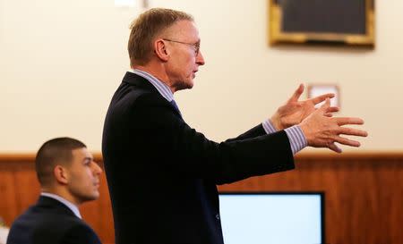 Defense attorney Charles Rankin asks a question during the murder trial of former NFL player Aaron Hernandez, (L), at the Bristol County Superior Court in Fall River, Massachusetts, February 19, 2015.. REUTERS/Charles Krupa/Pool