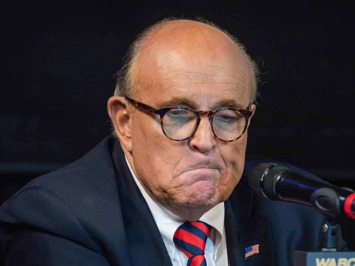 Rudy Giuliani frowns