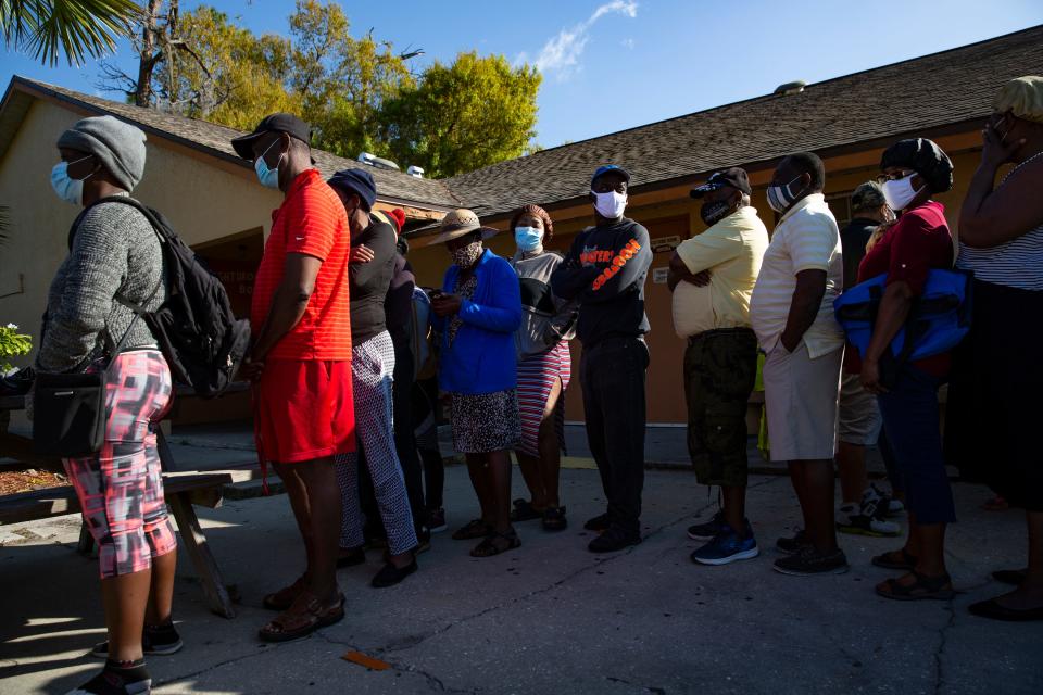 Immokalee residents line up to receive donations during the annual homeless count hosted by the Collier County Hunger and Homeless Coalition,  Thursday, Jan. 28, 2021, at Guadalupe Social Services in Immokalee. 