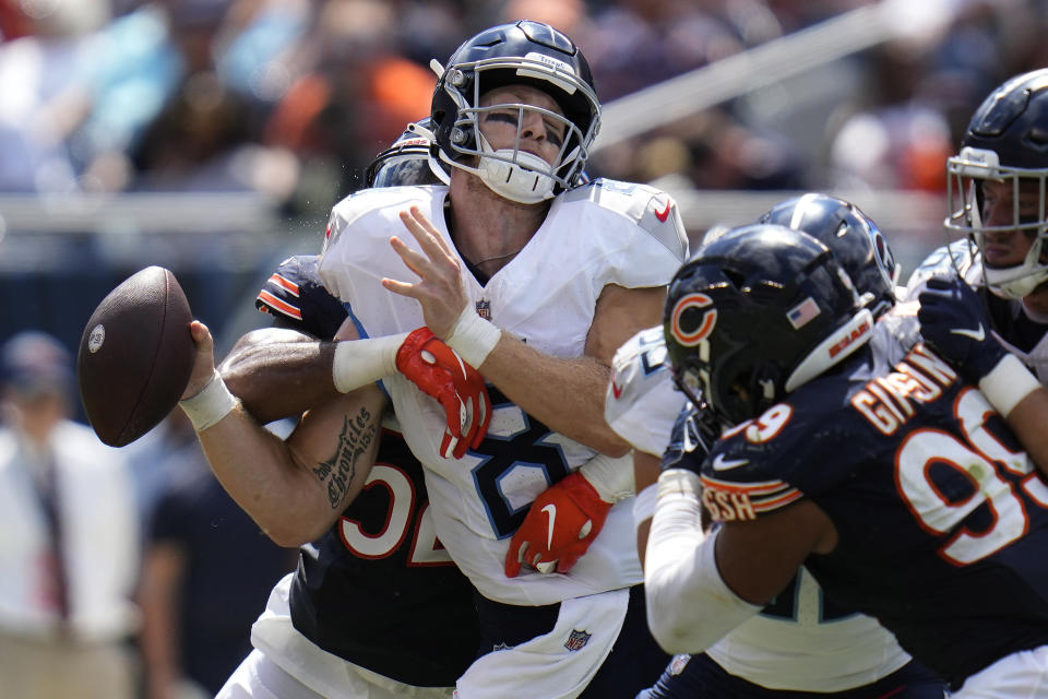 Tennessee Titans quarterback Will Levis (8) is sacked by Chicago Bears linebacker Terrell Lewis, left, during the second half of an NFL preseason football game, Saturday, Aug. 12, 2023, in Chicago. (AP Photo/Erin Hooley)