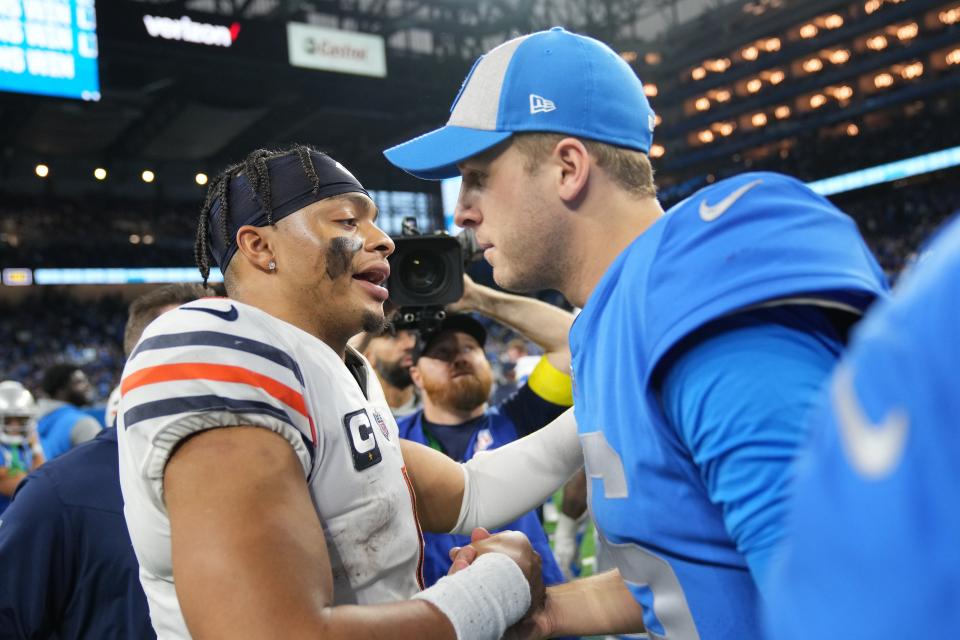 Bears quarterback Justin Fields and Lions quarterback Jared Goff embrace after the game at Ford Field on Jan. 1, 2023 in Detroit.