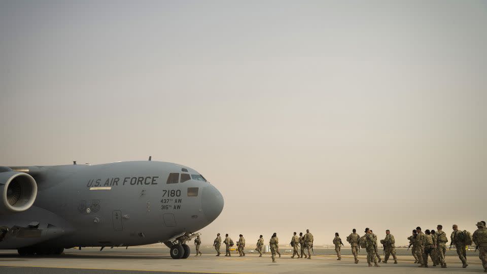 An image taken by the US Air Force shows US Army troops from the 1st Combined Arms Battalion, 163rd Cavalry Regiment, board a C-17 Globemaster III during an exercise at Ali Al Salem Air Base, in Kuwait on August 10, 2022. - Staff Sgt. Dalton Williams/U.S. Air Force/AP