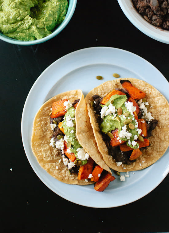 <strong>Get the <a href="http://cookieandkate.com/2014/sweet-potato-and-black-bean-tacos-with-avocado-pepita-dip/">Sweet Potato and Black Bean Tacos with Avocado-Pepita Dip recipe</a>&nbsp;from Cookie + Kate</strong>