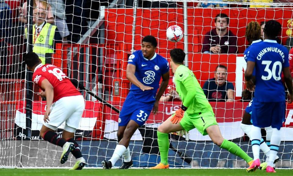 Casemiro watches as his header flies past Kepa Arrizabalaga to give Manchester United an early lead.