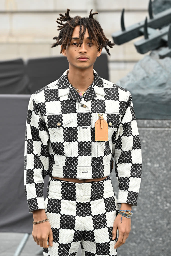 Close-up of Jaden wearing a large-checkered pantsuit