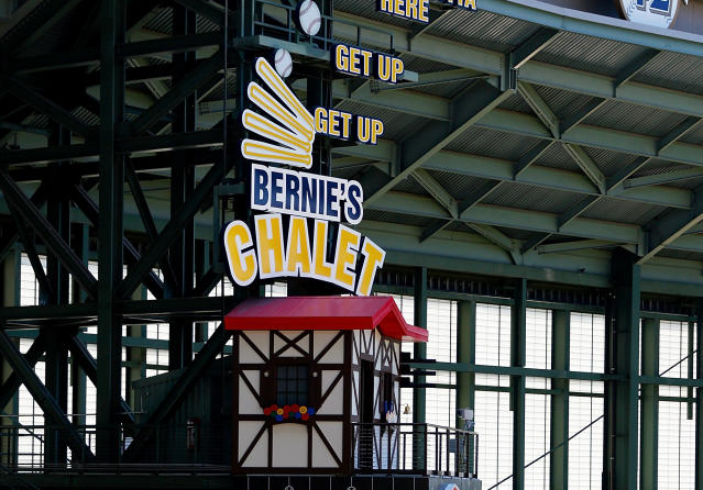 MILWAUKEE, WI - MAY 11: Bernie Brewer, the Brewers mascot slides down a  large slide after a home run is hit during the game between the Milwaukee  Brewers against the San Diego