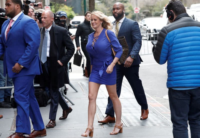 FILE PHOTO: Adult-film actress Stephanie Clifford, also known as Stormy Daniels, arrives at ABC studios with her attorney Michael Avenatti to appear on The View talk show in New York City