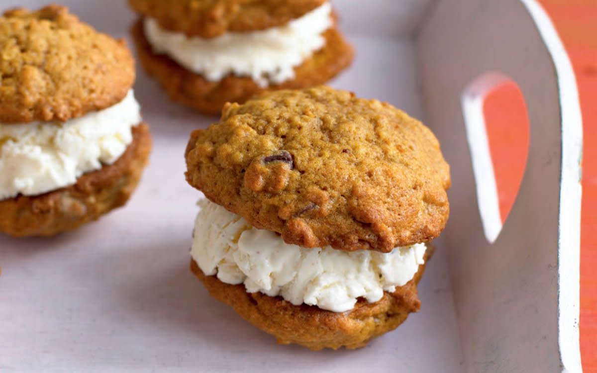 <p>Donna Eagan</p><p>The tangy taste of mascarpone ice cream makes a tasty contrast to the warm, spicy chocolate flavor and chewy texture of the pumpkin spice <a href="https://parade.com/944248/parade/christmas-cookies/" rel="nofollow noopener" target="_blank" data-ylk="slk:cookies;elm:context_link;itc:0;sec:content-canvas" class="link rapid-noclick-resp">cookies</a>.</p><p><strong>Get the recipe: </strong><a href="/60565/parade/pumpkin-mascarpone-ice-cream-sandwiches/" data-ylk="slk:Pumpkin Mascarpone Ice Cream Sandwiches;elm:context_link;itc:0;sec:content-canvas" class="link rapid-noclick-resp"><strong>Pumpkin Mascarpone Ice Cream Sandwiches</strong></a></p>