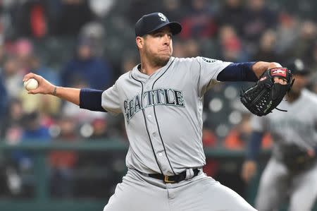 FILE PHOTO: May 3, 2019; Cleveland, OH, USA; Seattle Mariners relief pitcher Anthony Swarzak (30) throws a pitch during the ninth inning against the Cleveland Indians at Progressive Field. Mandatory Credit: Ken Blaze-USA TODAY Sports