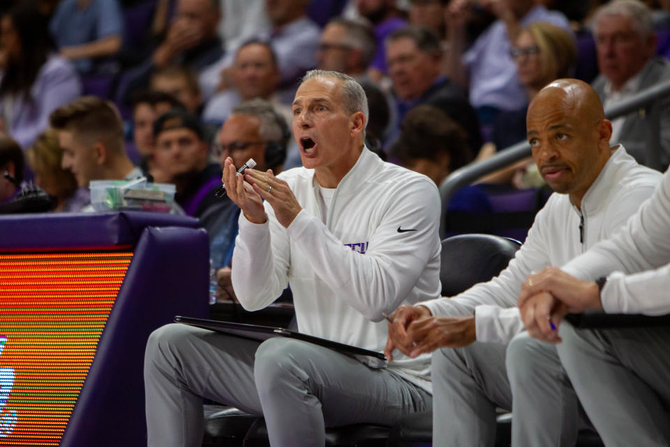 Assistant coaches Ed Schilling (left) and Jamall Walker (right) react to the game at GCU Arena in Phoenix on Nov. 6, 2023.