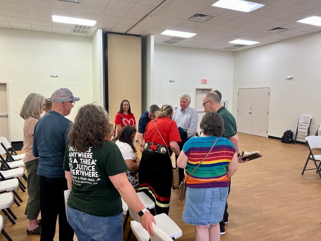 Community members gather at Town Creek Community Center in Winnabow on Thursday, May 25, for a special-called meeting of the Classical Charter Schools of America Board of Trustees.