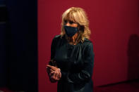 Jill Biden, wife of Democratic presidential candidate former Vice President Joe Biden, takes her seat before the first presidential debate Tuesday, Sept. 29, 2020, at Case Western University and Cleveland Clinic, in Cleveland, Ohio. (AP Photo/Patrick Semansky)