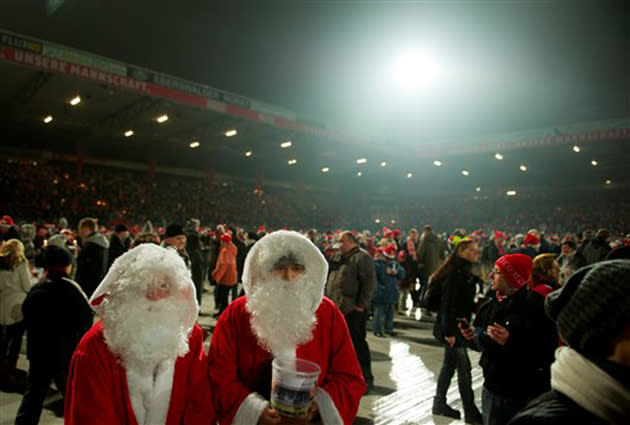 Drink enough mulled wine and you start seeing double Santa (AP)