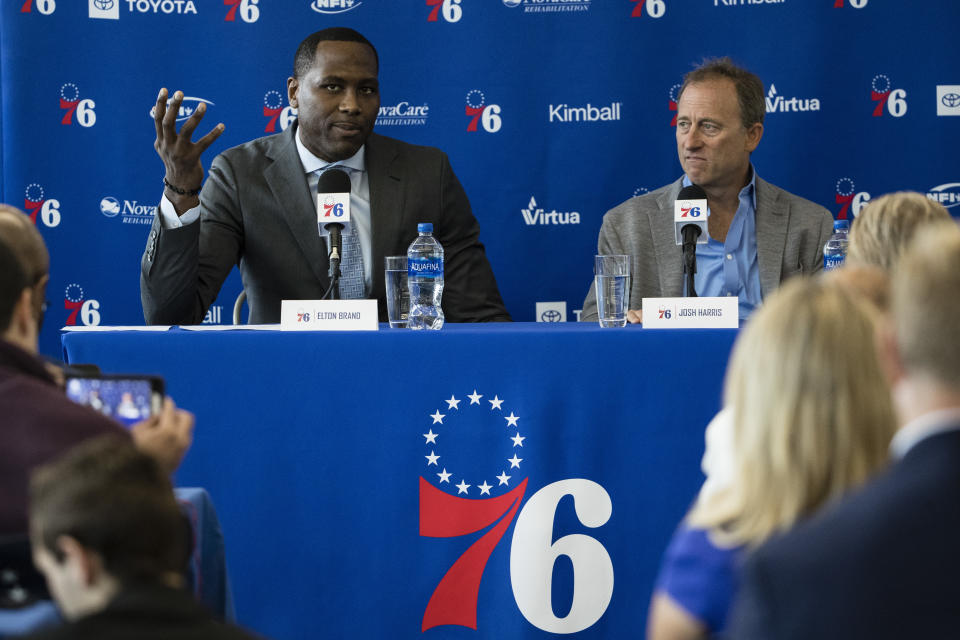 Philadelphia 76ers incoming general manager Elton Brand, left, accompanied by owner Josh Harris, speaks at the NBA basketball team's practice facility in Camden, N.J., Thursday, Sept. 20, 2018. (AP Photo/Matt Rourke)