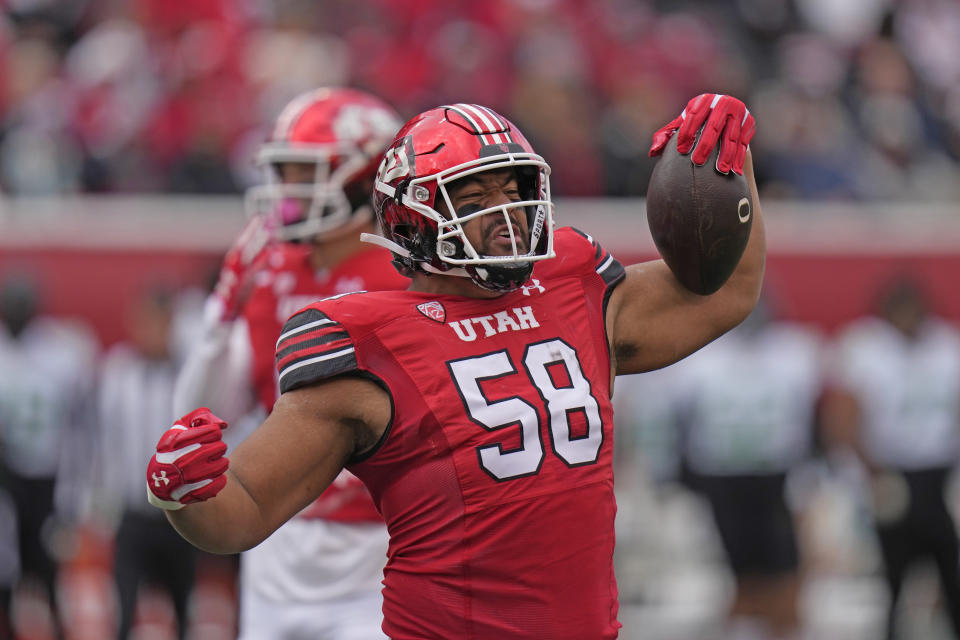 Utah defensive tackle Junior Tafuna (58) reacts after a fumble recovery during the first half of an NCAA college football game against Oregon Saturday, Oct. 28, 2023, in Salt Lake City. (AP Photo/Rick Bowmer)