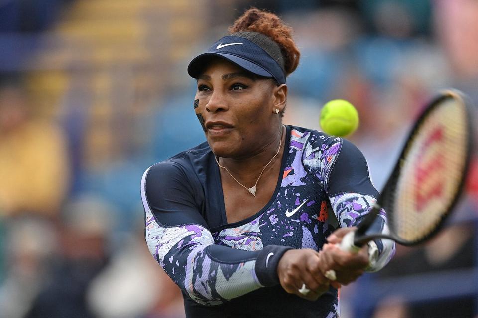 US player Serena Williams returns the ball to Spain's Sara Sorribes Tormo and Czech Republic's Marie Bouzkova during her round of 8 women's doubles tennis match, that she plays with Tunisia's Ons Jabeur, on day three, of the Eastbourne International tennis tournament in Eastbourne, southern England on June 21, 2022.