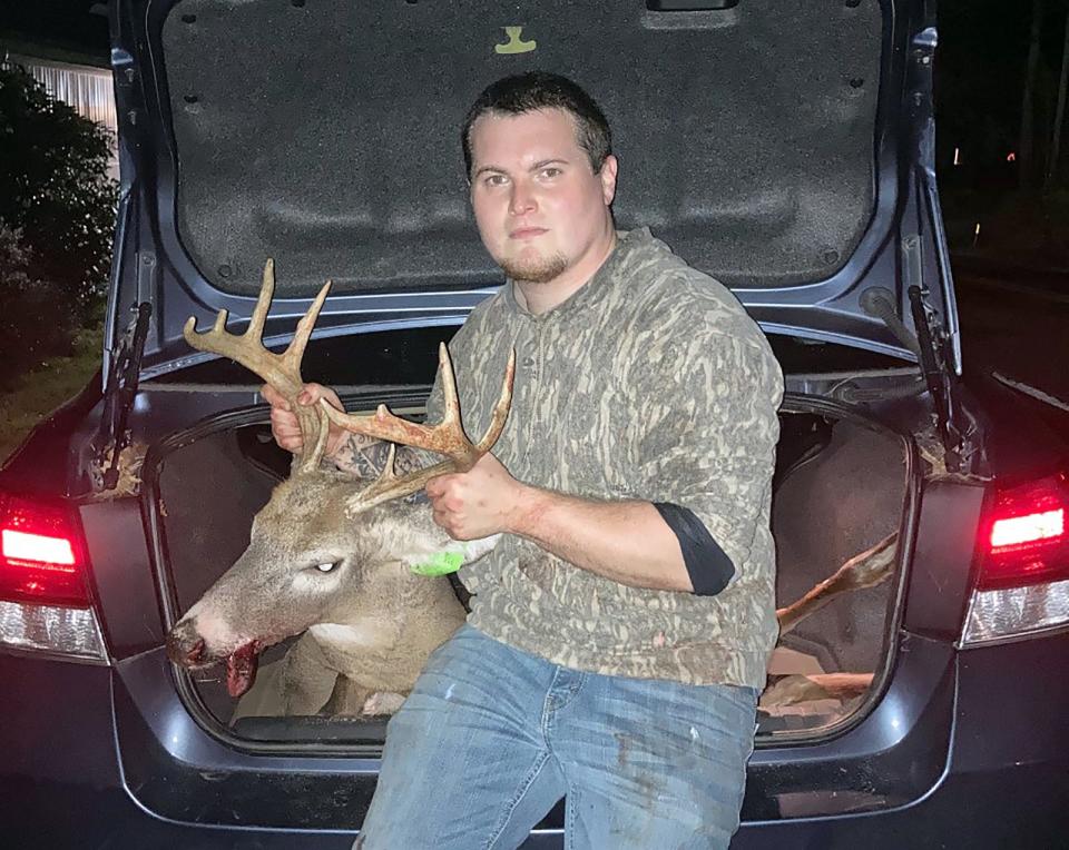 Buck Strunk of Wayne County holds the 10-point he harvested Nov. 2 in eastern Pennsylvania.