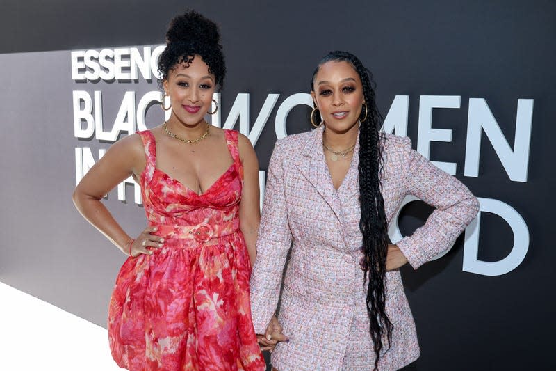 Tamera Mowry-Housley, left; Tia Mowry-Hardrict attend the 2023 ESSENCE Black Women In Hollywood Awards on March 09, 2023 in Los Angeles, California.