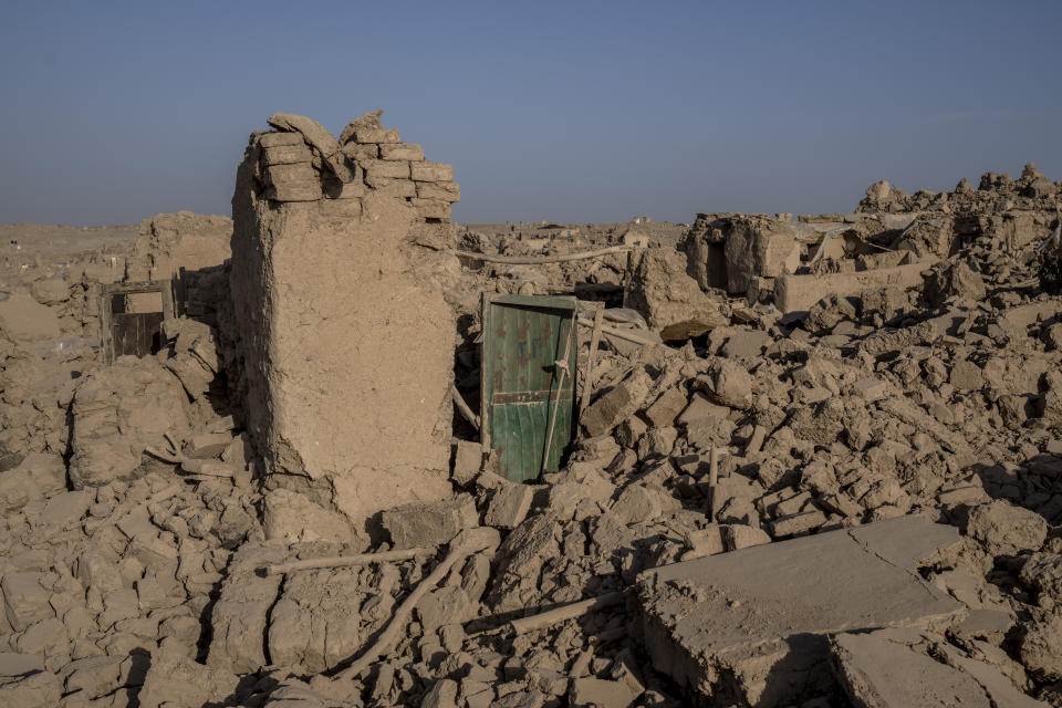 Destroyed houses by an earthquake are seen in Zenda Jan district in Herat province, western Afghanistan, Wednesday, Oct. 11, 2023. Another strong earthquake shook western Afghanistan on Wednesday morning after an earlier one killed more than 2,000 people and flattened whole villages in Herat province in what was one of the most destructive quakes in the country's recent history. (AP Photo/Ebrahim Noroozi)